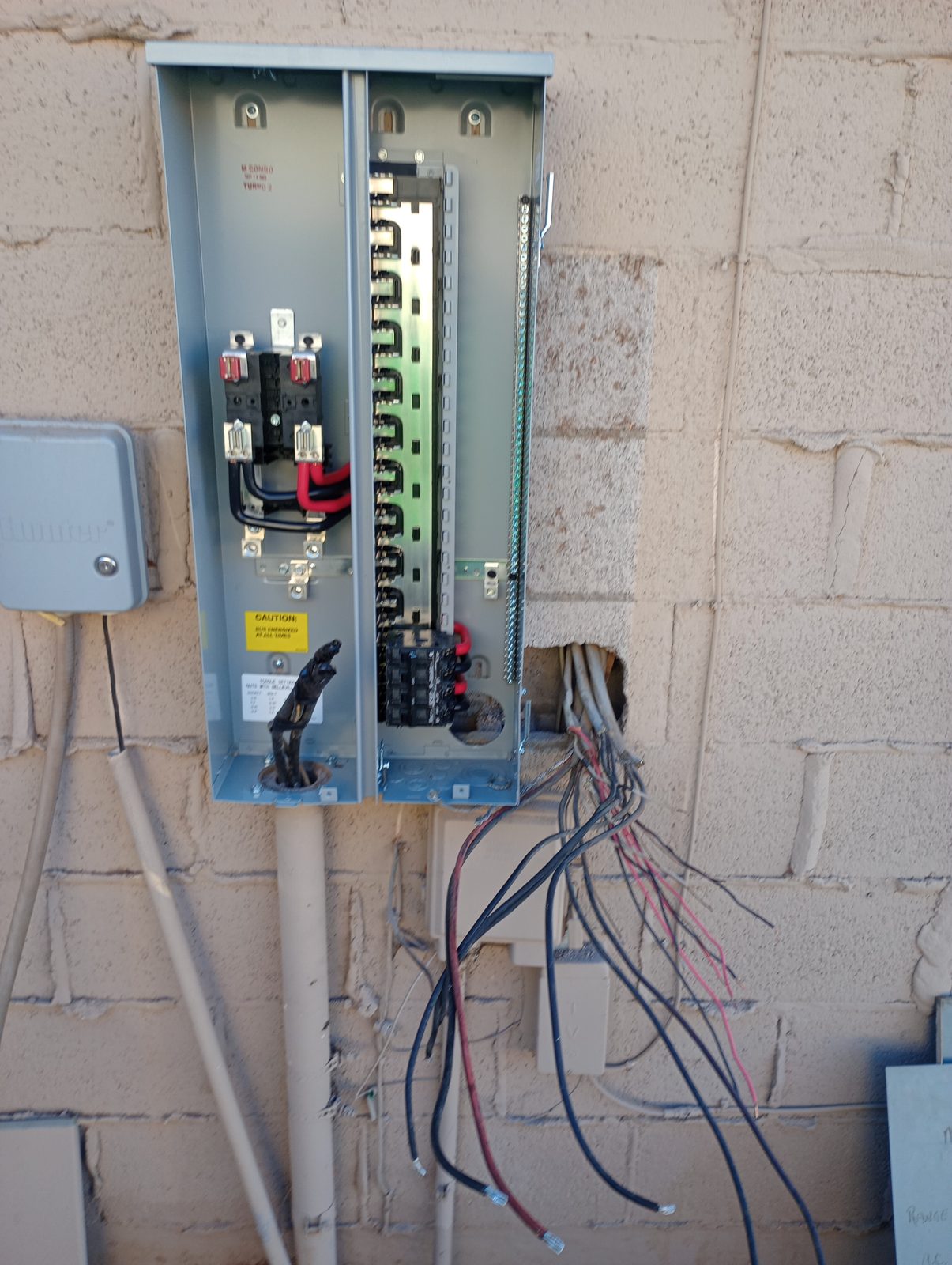Open electrical panel showing branch circuit wiring