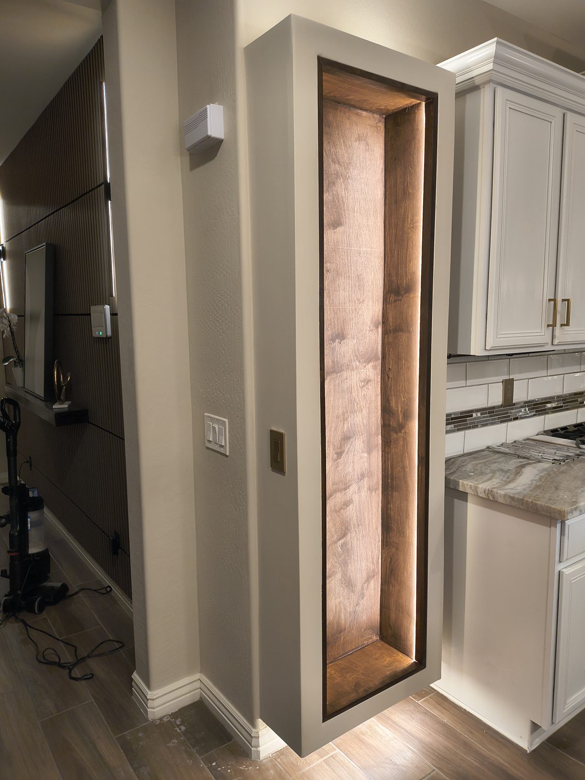 Floating shelves built into wall opening