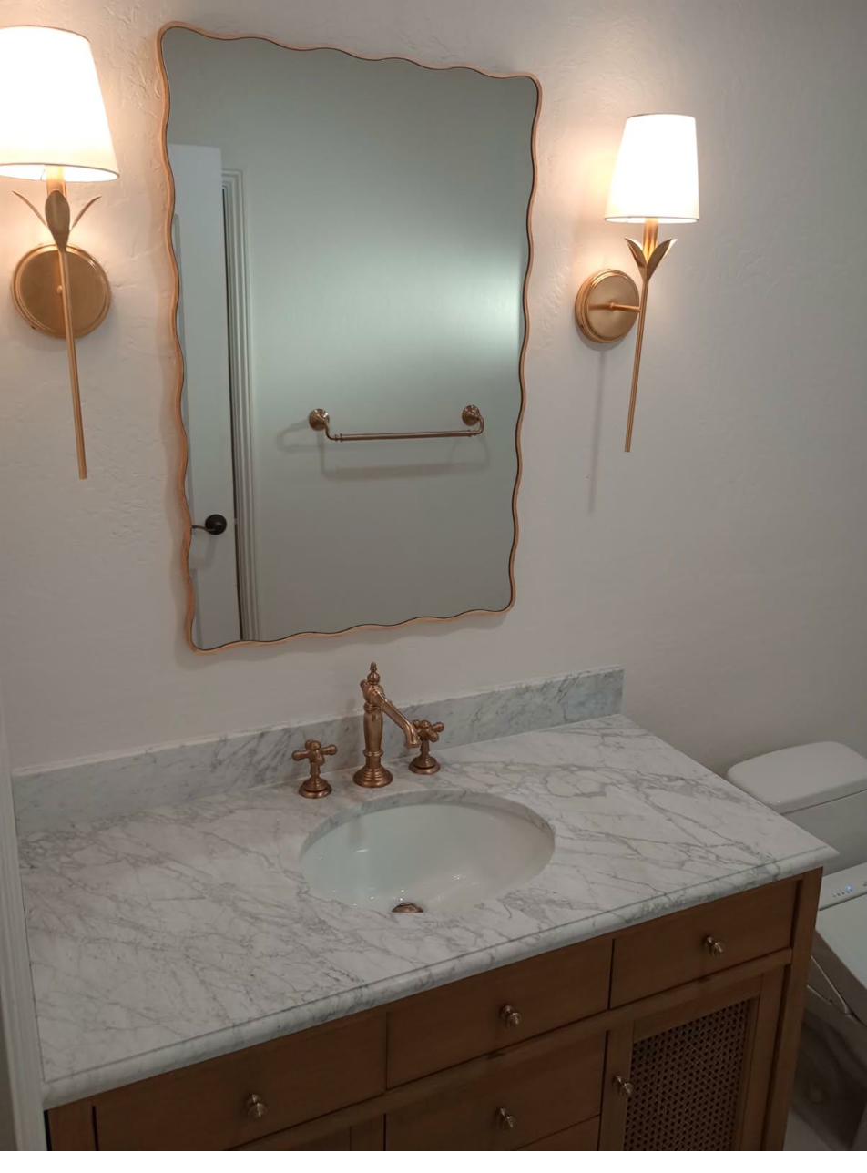 Marble vanity and brass faucet